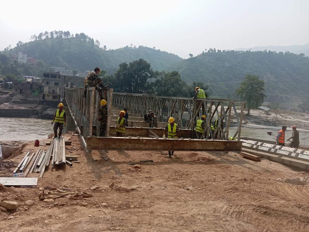 खुर्कोटको पुल निर्माणले तीव्रता पाएसंगै जाेडिनेभयाे छोटो दूरीको सडकमार्ग